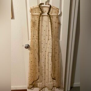 New, sheer embroidered cape/overlay.